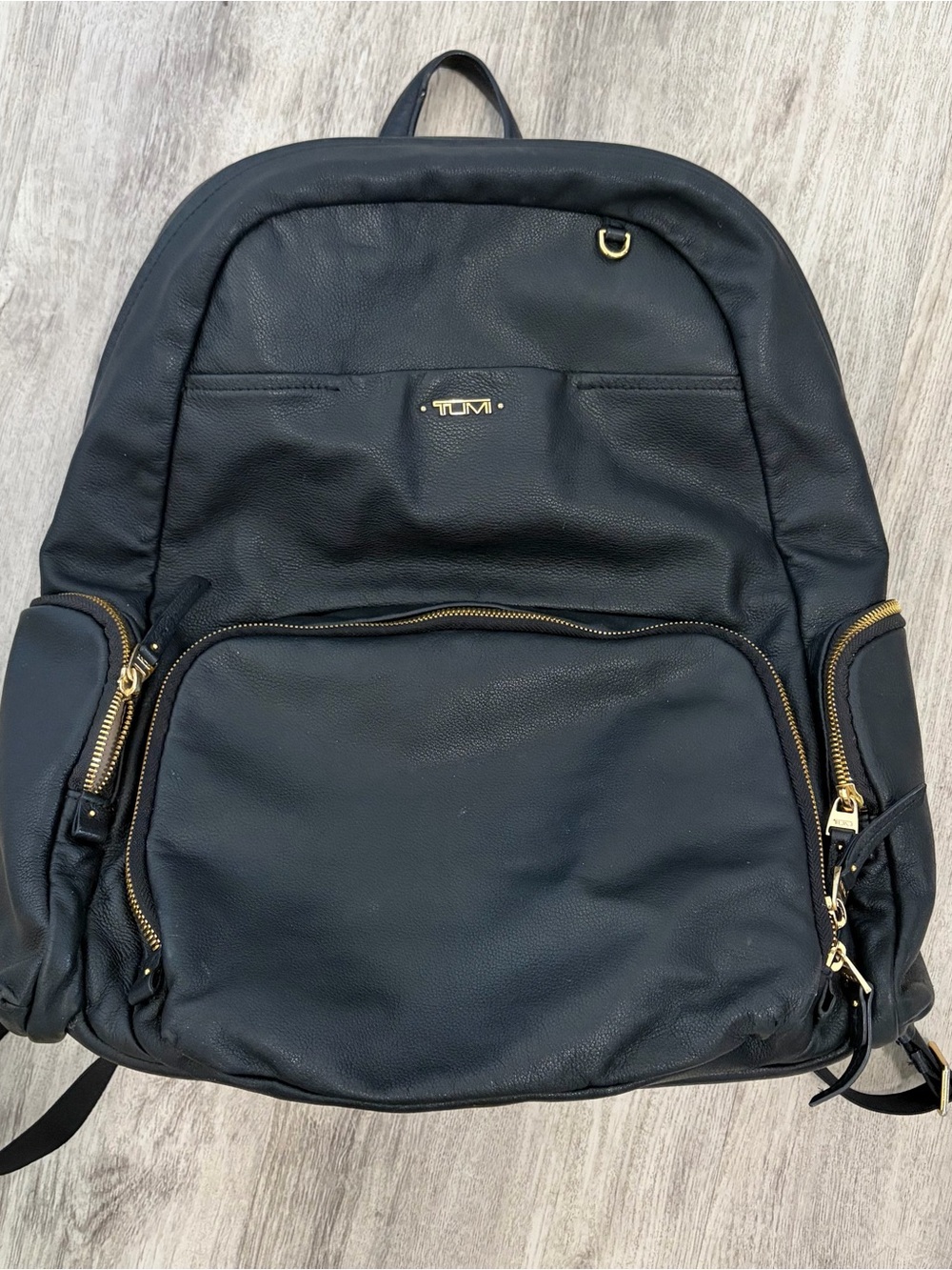 Tumi Black Leather Backpack with Gold-Tone Hardware Accents